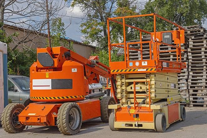 warehouse forklift in action during a busy workday in Crane, MO